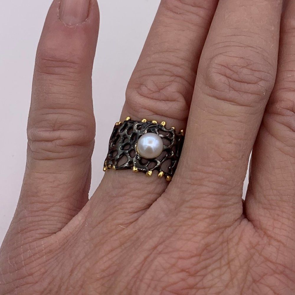 New, no tags, solid sterling 925 silver, black rhodium, 22 K gold, real pearl